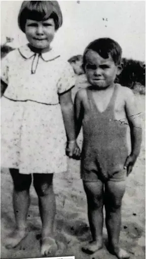  ??  ?? Little star: Ronnie with a friend and, inset, with Anne, the taller girl who stole his heart