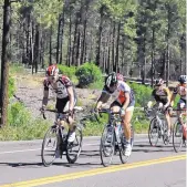  ??  ?? Riders in the Tour de Los Alamos have 2,000 feet of climbing on the route.