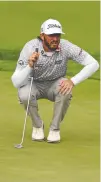  ?? GREGORY SHAMUS/GETTY IMAGES ?? Max Homa lines up a putt during the final round of the Wells Fargo Championsh­ip.