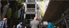  ?? File photo ?? Secretary of Housing and Urban Developmen­t Marcia Fudge tours apartments with other officials in San Francisco in 2021.