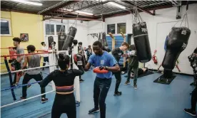  ??  ?? Boxers in the Empire Fighting Chance gym in Bristol.