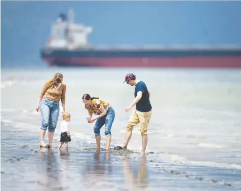  ?? JASON PAYNE/POSTMEDIA ?? With many dads now working from home, there’s more time for outings to places like Jericho Beach.