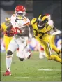  ?? Kyusung Gong / Associated Press ?? Chiefs wide receiver Tyreek Hill sprints with the ball past Rams cornerback Sam Shields on Monday in Los Angeles.
