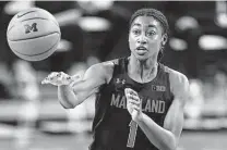  ?? Carlos Osorio / Associated Press ?? Diamond Miller scored 17 points as Maryland clinched at least a share of the Big Ten title for the sixth time in seven seasons.