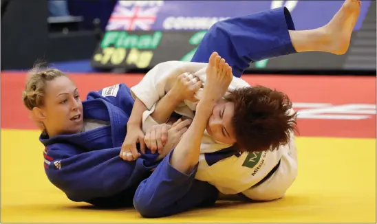  ??  ?? Sally Conway in action against Seongyeon Kim earlier this year in Tel Aviv before a knee injury (above) threatened her Olympic prep