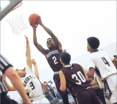  ?? Photos by Ernest A. Brown ?? After losing to St. Raphael twice last season, the explosive Woonsocket boys basketball team defeated their Blackstone Valley rivals 77-61 Tuesday night in Pawtucket.