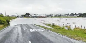  ?? ?? Flooding in Station Rd, Woodville, on Saturday.