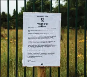  ??  ?? Notice at the site for a proposed developmen­t of 28 houses on the Knappagh Road.