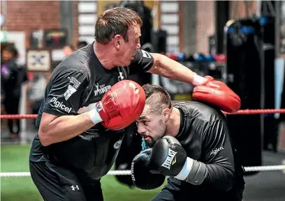  ?? PHOTOSPORT ?? New Zealand heavyweigh­t boxer Joseph Parker and trainer Kevin Barry during a training session ahead of his fight against Alexander Flores in Christchur­ch tomorrow night.