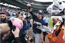  ?? MATT MARTON/THE ASSOCIATED PRESS ?? Milwaukee Brewers centre-fielder Christian Yelich celebrates after the Brewers defeated the Chicago Cubs 3-1 in a tiebreaker baseball game Monday to claim the NL Central title.