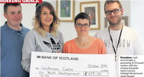  ??  ?? Donation Leah, second right, is presenting SCYD youth workers with the cheque alongside Aaron Cannon, Ashleigh Mustard and Jamie Stewart