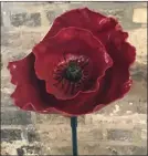  ?? A.J. WILLIAMS/Special to The Okanagan Weekend ?? A poppy statue at the In Flanders Fields Museum.