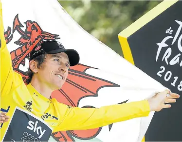  ?? Picture: JEAN CATUFFE/GETTY IMAGES ?? TOUR TRIUMPH: Winner Geraint Thomas during the final podium ceremony on the Champs-Elysees in Paris following stage 21 of Le Tour de France 2018