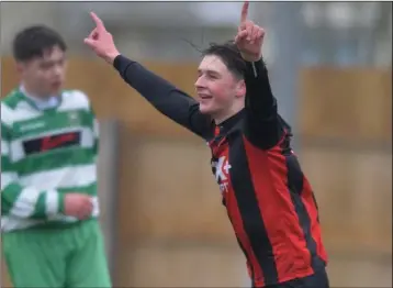  ??  ?? Cian Murphy celebrates scoring the opener for Bellurgan against Trim Celtic.