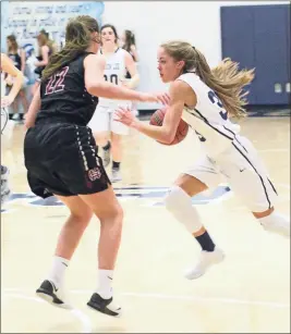  ?? / Scott Herpst, file photo ?? Versatile junior Gracie O’neal will be a go-to player for the Lady Trojans this season as they look to get back to the Class A Public School state tournament.