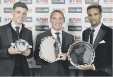  ??  ?? 2 There was more silverware for Celtic last night as young player of the year Kieran Tierney, manager of the year Brendan Rodgers and player of the year Scott Sinclair collected their Scottish Football Writers’ awards in Glasgow.