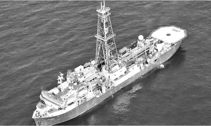  ?? — AFP photo ?? This undated handout aerial photo received from Australian National University in Canberra shows the drill ship Jodies Resolution at sea.