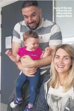  ??  ?? Lucky: Dr Brendan O’hare with wife Aileen and their daughter Niamh