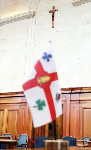  ?? JOHN MAHONEY ?? A crucifix has been hanging in the council chamber at Montreal city hall since 1937. Mayor Valérie Plante says once planned renovation­s to the chamber are done in three years, the symbol won’t be put back up.