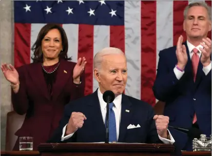  ?? JACQUELYN MARTIN/POOL/GETTY IMAGES ?? President Joe Biden delivers the State of the Union address to a joint session of Congress as Vice President Kamala Harris and House Speaker Kevin Mccarthy (R-calif.) listen on Tuesday in the House Chamber of the U.S. Capitol in Washington, DC.