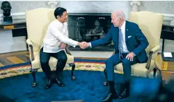  ?? DOUG MILLS/NEW YORK TIMES FILE PHOTO ?? President Joe Biden and Philippine President Ferdinand R. Marcos Jr. meet last year at the White House. With China aggressive­ly asserting its claims on the South China Sea, Marcos spent his first year on the job beefing up Manila’s alliance with its oldest ally, the United States.