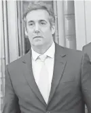  ?? MARY ALTAFFER/AP ?? Questions surround whether Trump’s reimbursem­ent to his lawyer Michael Cohen was intended to help Trump win the election.