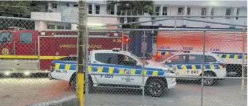  ?? (Photo: Akera Davis) ?? A fire truck and soldiers were deployed to the Ocho Rios Police Station on Wednesday in response to what has been described as a major disturbanc­e.