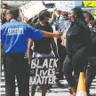  ?? MAKOWICHUK
DARREN ?? Nearly 150 Black Lives Matter protesters rallied in front of Global Calgary, blocking traffic but remaining peaceful on Monday.