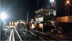  ??  ?? Lowdham signal box is prepared for its lift by road crane in the early hours of October 25. (Lowdham Heritage Trust)