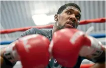  ?? PHOTO: GETTY IMAGES ?? Anthony Joshua seems ready to give Joseph Parker a decent share of their unificatio­n fight purse.