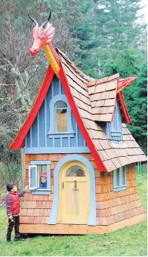  ?? MAGICAL PLAYHOUSES ?? Children play in Magical Playhouses’ dragon-themed playhouse in Port Townsend, Wash.