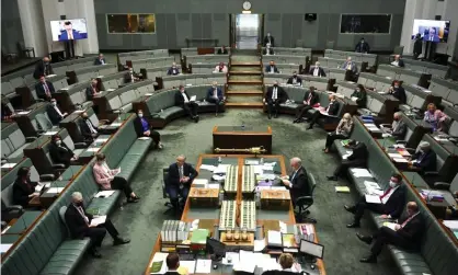  ?? Photograph: Lukas Coch/AAP ?? Parliament will sit with minimum MPs in both houses next week as the Morrison government works to pass key pieces of legislatio­n.