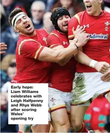  ??  ?? Early hope: Liam Williams celebrates with Leigh Halfpenny and Rhys Webb after scoring Wales’ opening try