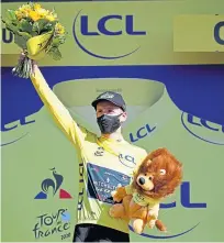  ??  ?? Adam Yates on the podium at Mont Aigoual.