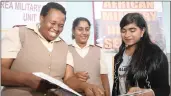  ??  ?? Showing a keen interest in joining the South African Military, Tehilla Isaac listens attentivel­y to Major Maria Buthelezi and Captain Rowena Govender.