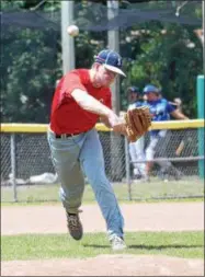  ?? JOHN BREWER - ONEIDA DAILY DISPATCH ?? Sherrill third baseman Zach Nell throws out a runner at first base against Helmuth-Ingalls on Saturday, July 7.