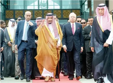  ??  ?? File photo shows Najib (second right) accompanyi­ng King Salman (middle) and his entourage during his four-day visit to Malaysia last week. — Bernama photo