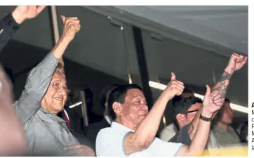  ??  ?? All good: Dr Mahathir and Duterte cheering after Pacquiao beat Matthysse at the Axiata Arena in Bukit Jalil.