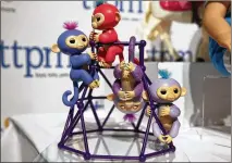  ?? RICHARD DREW / AP ?? Fingerling­s from WowWee are on display in New York. Shoppers rushing to find Fingerling­s, the robotic monkeys that are one of the holiday season’s hottest toys and already hard to find, say they’ve been fooled into buying fakes.