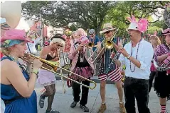  ?? INFROGMATI­ON OF NEW ORLEANS/WIKI ?? New Orleans’ French Quarter hosts three parades on Easter Sunday.