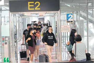  ?? CHAROENKIA­TPAKUL WICHAN ?? Tourist arrivals at Suvarnabhu­mi airport on May 1, 2022. The TAT is optimistic arrivals in 2023 can meet the prime minister’s target of 20 million.