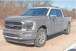 ?? KGP PHOTOGRAPH­Y ?? The 2021 Ford F-150 was spied undergoing road testing near its automaker headquarte­rs in Dearborn, Mich.