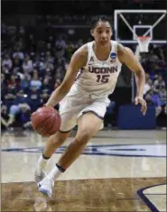  ?? JESSICA HILL — THE ASSOCIATED PRESS ?? Connecticu­t’s Gabby Williams drives toward the basket against Albany during the first half.