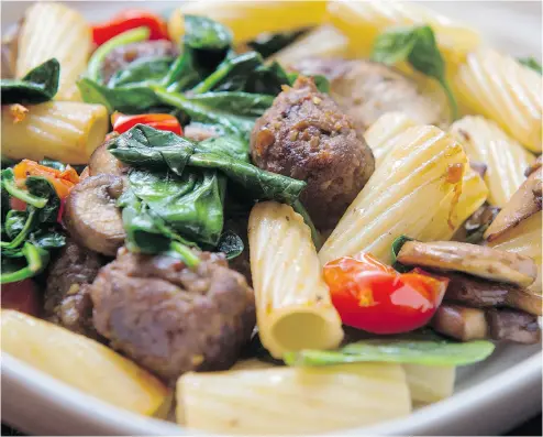  ?? TYLER ANDERSON / NATIONAL POST ?? Rigatoni with Sausage Meatballs and Mushrooms is a time-saving and easy-to-make recipe. The great thing about sausages, Bonnie Stern writes, is that they are so well-seasoned you don’t usually need a lot of extra ingredient­s.