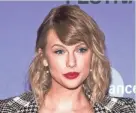  ?? CHARLES SYKES/INVISION/AP ?? Taylor Swift’s eighth album “Folklore” debuted at No. 1 on Billboard’s 200 albums chart this week, marking the best first-week sales of the year and giving the pop star her seventh No. 1 title on the chart.
