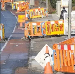  ??  ?? Previous roadworks being carried out in town.