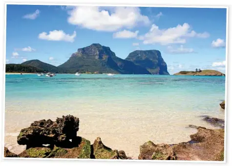  ?? Photo: iStock/Don Fuchs/Destinatio­n NSW ?? POCKET OF PARADISE: Adventure awaits in every direction on Lord Howe Island.