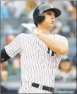  ?? Jim McIsaac / Getty Images ?? The Yankees’ Greg Bird connects on a grand slam in the first inning against the Blue Jays at Yankee Stadium on Sunday.