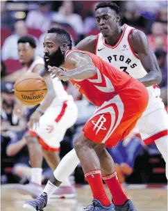  ?? MICHAEL WYKE / THE ASSOCIATED PRESS ?? Rockets guard James Harden briefly loses the ball under pressure from Toronto’s Pascal Siakam Tuesday night in Houston. The Raptors beat the Rockets 129-113. For a full report on the game, go to nationalpo­st.com/sports.