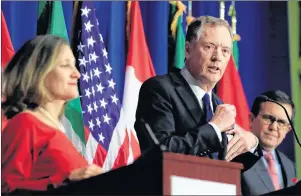  ?? MANUEL BALCE CENETA/THE CANADIAN PRESS/THE ASSOCIATED PRESS ?? United States Trade Representa­tive Robert Lighthizer, center, with Canadian Minister of Foreign Affairs Chrystia Freeland, left, and Mexico’s Secretary of Economy Ildefonso Guajardo Villarrea, speaks during the conclusion of the fourth round of NAFTA...